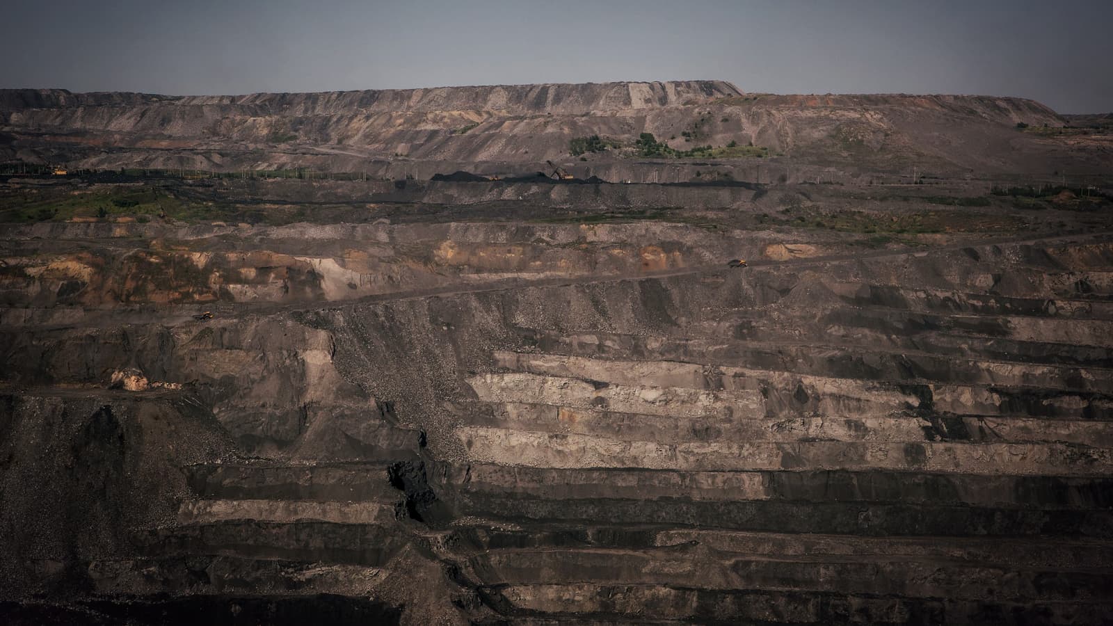 Terraced benches of an open-pit coal mine